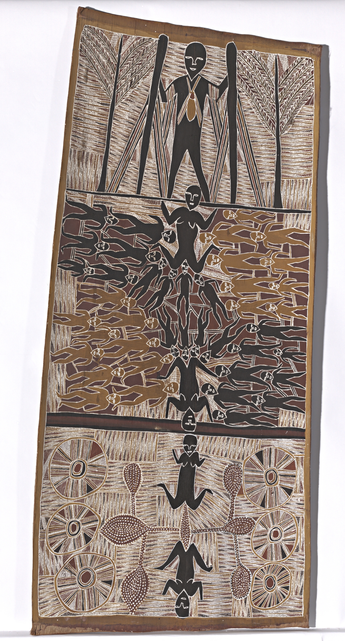 Vertical painting with three boxy sections. In the middle, figures descend in a single line from the top to the bottom in of the painting. There are multiple figures in the middle portion. The figures and intricate designs of possible abstracted trees and other objects are painted in various shades of brown and ocher; white is used for the background and outlining of figures. 