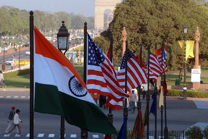 US and Indian flags fly on Rajpath in front of India Gate in New Delhi. (Manpreet Romana/AFP/Getty Images)