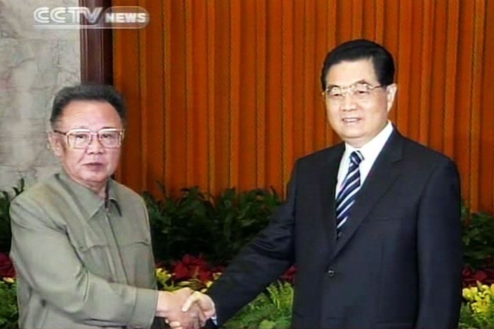 A TV grab from CCTV taken on May 7, 2010 shows Chinese President Hu Jintao (R) shaking hands with North Korean leader Kim Jong-Il in Beijing on May 7. (STR/AFP/Getty Images) 