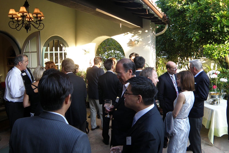 Guests mingled at the home of Asia Society Trustee Emeritus Thomas McLain on June 21, 2010. 