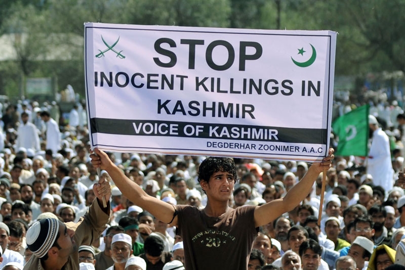 A Kashmiri protester holds a banner during an anti-India rally in Srinagar on September 11, 2010. The Muslim-majority Kashmir valley has been rocked by unrest since a teenage student was killed by a police tear-gas shell on June 11. (Sajjad Hussain/AFP/Getty Images) 