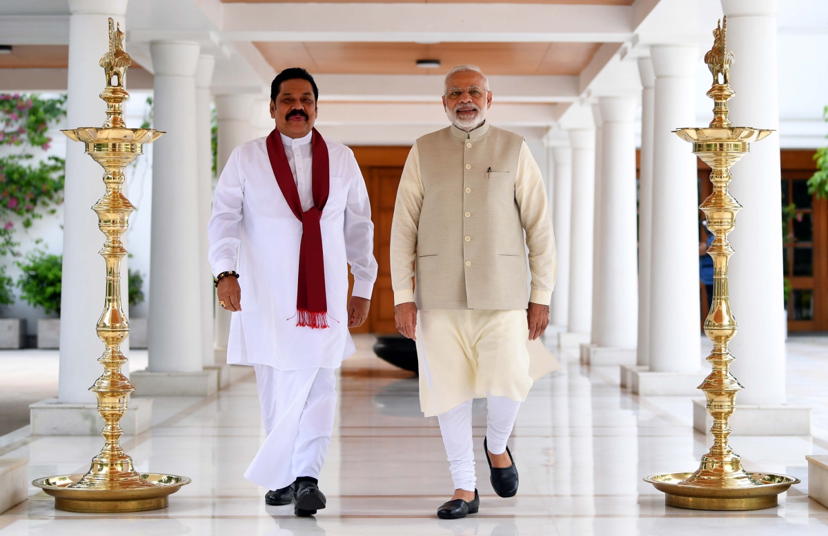 Sri Lankan Prime Minister Mahinda Rajapaksa walks with Indian Prime Minister Narendra Modi on September 12, 2018 in New Delhi, India. 