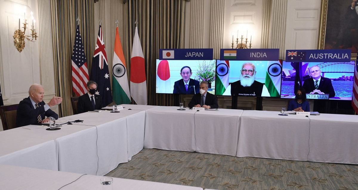 U.S. President Joe Biden (L), with Secretary of State Antony Blinken (2nd L), meets virtually with members of the "Quad" alliance of Australia, India, Japan, and the U.S. — Japanese Prime Minister Yoshihide Suga, Indian Prime Minister Narendra Modi, and Australian Prime Minister Scott Morrison — in the State Dining Room of the White House in Washington, D.C., on March 12, 2021. (Olivier Douliery/AFP/Getty Images)