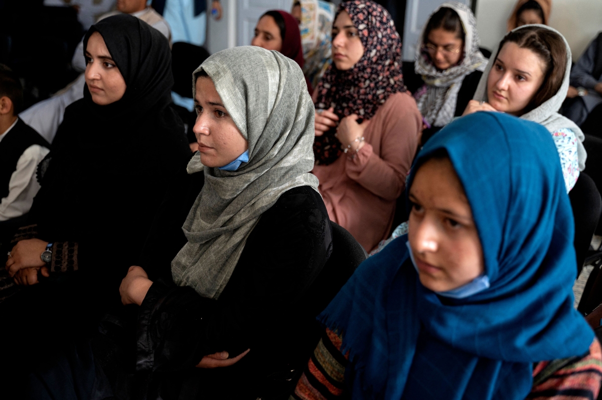 Afghan women attend an annual poetry gathering held in Kabul on July 7, 2022, the first such gathering since the Taliban came to power and stripped women of their freedoms.