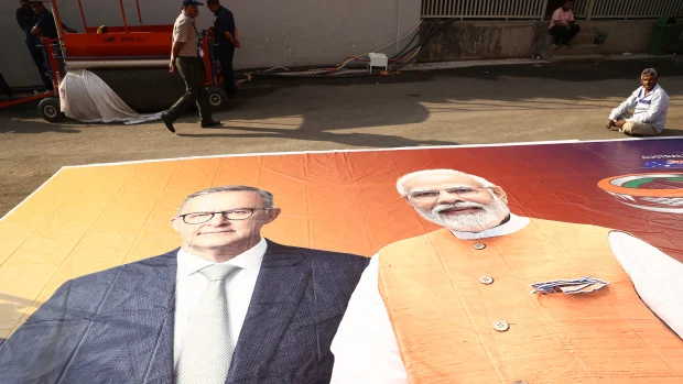  Posters being prepared in Ahmedabad for the meeting between the Indian and Australian prime ministers.  Getty