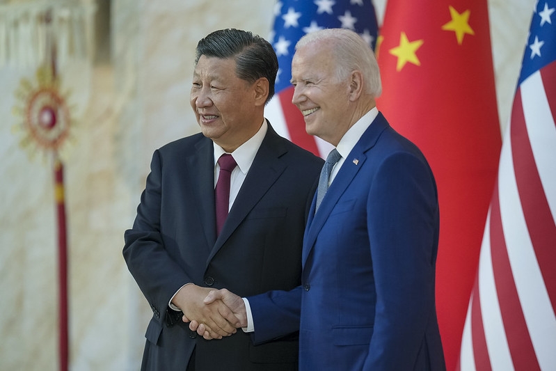 President Joe Biden greets and poses for a photo with Chinese President Xi Jingping ahead of their bilateral meeting, Monday, November 14, 2022, at the Mulia Resort in Bali, Indonesia.