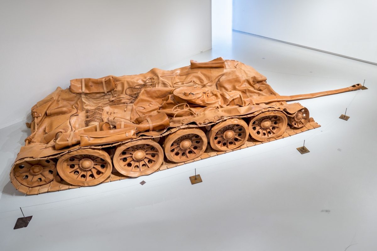 HE Xiangyu, Tank Project, 2011-2013: A deflated life-size military tank made out of luxury Italian leather by factory women.