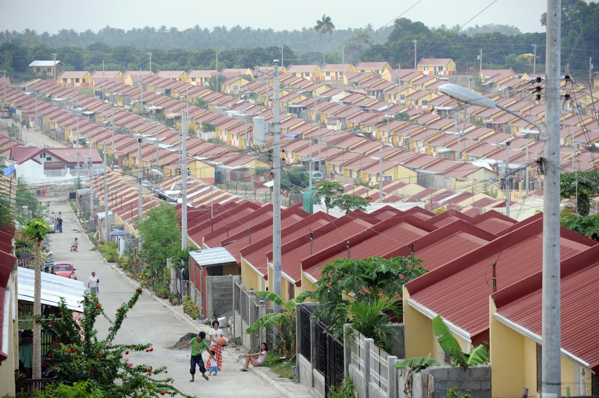 As the world marks Earth Day, construction of low-cost housing develops out from a former forest zone in Davao city in the southern Philippines island of Mindanao on April 21, 2008. (ROMEO GACAD/AFP/Getty Images) 