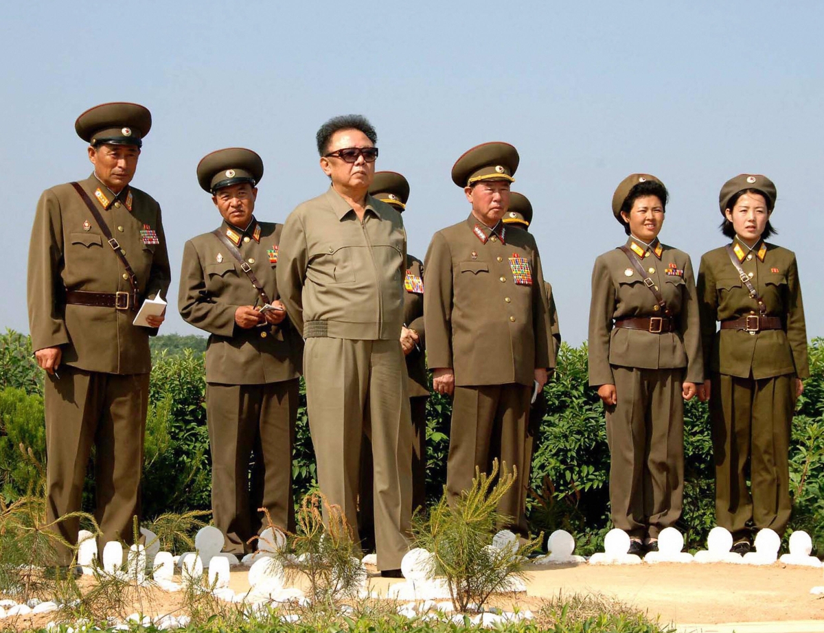 This undated picture, released from Korean Central News Agency on June 11, 2008, shows North Korean leader Kim Jong Il (L) inspecting Korean People's Army unit 958 at an undisclosed location. (STR/AFP/Getty Images) 