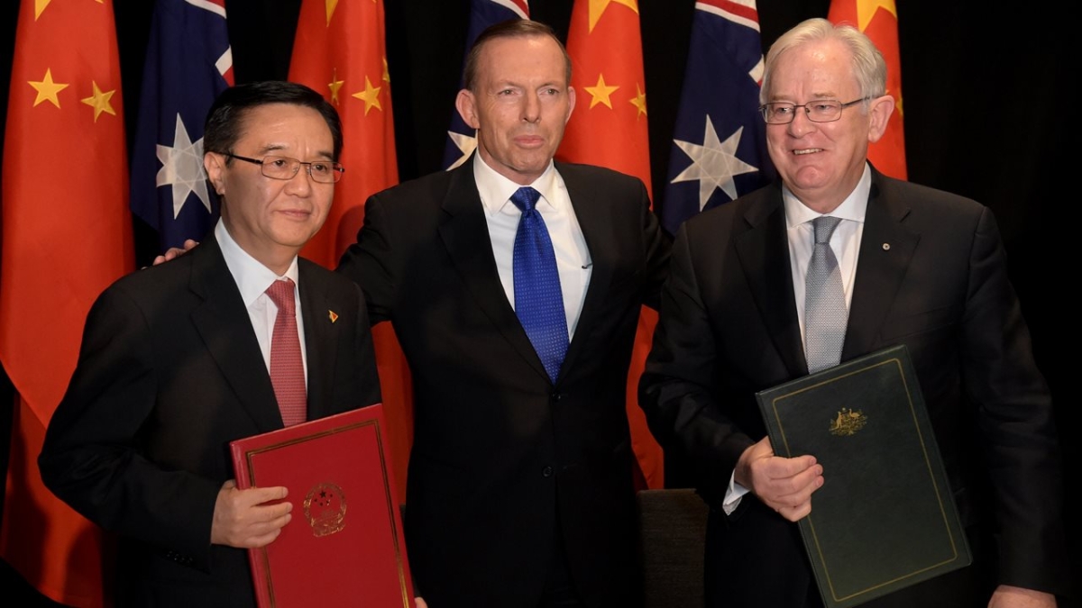 (Left to right) China's Minister of Commerce Dr Gao Hucheng, Prime Minister Tony Abbott and Trade and Investment Minister Andrew Robb after the signing of ChAFTA. Image courtesy of Department of Foreign Affairs and Trade