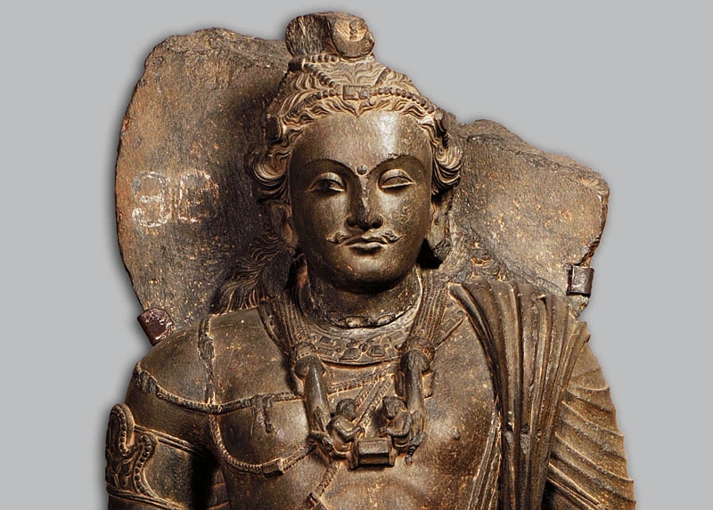 Standing bodhisattva Maitreya. Pakistan. 3rd–4th century. Grey schist. H. 39 3/8 x W. 15 3/16 x D. 5 1/2 in. (100 x 38.5 x 14 cm). Central Museum, Lahore, G-131.