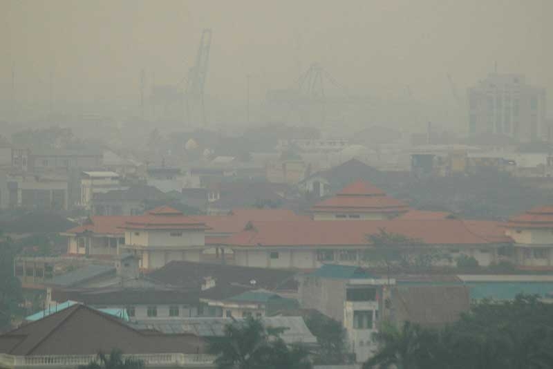 In a picture taken on September 9, 2009 haze covers Pontianak city in Kalimantan on Indonesia's Borneo island. The number of haze-causing spot fires on Indonesia's half of Borneo island have more than doubled, sending pollution into Malaysia, officials said on September 29, 2009. (AFP/AFP/Getty Images)