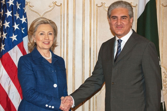 US Secretary of State Hillary Clinton is greeted by Pakistani Foreign Minister Makhdoom Shah Mehmood Qureshi as she arrives for a bilateral meeting with him at the Pakistani Foreign Ministry in Islamabad on July 19, 2010. (Paul J. Richards/AFP/Getty Images)