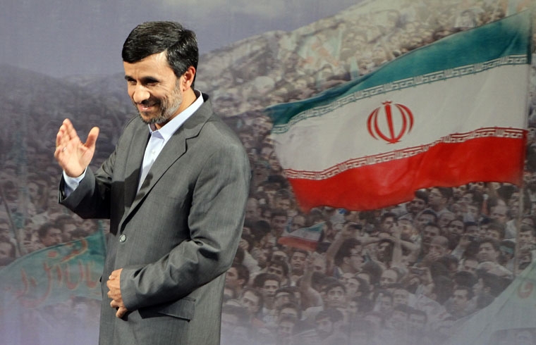 Iranian President Mahmoud Ahmadinejad gestures after speaking to the press in Tehran on June 28, 2010. (Atta Kenare/AFP/Getty Images) 