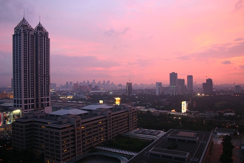 Sunset over the Makati City skyline in Manila, Philippines. (Canlasa//Flickr)