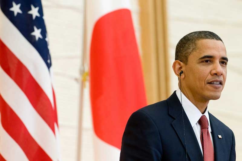 President Barack Obama attends a joint press conference with Japanese Prime Minister Yukio Hatoyama (unseen) at Kantei, the Prime Minister's office and official residence, in Tokyo on November 13, 2009. (Saul Loeb/AFP/Getty Images)