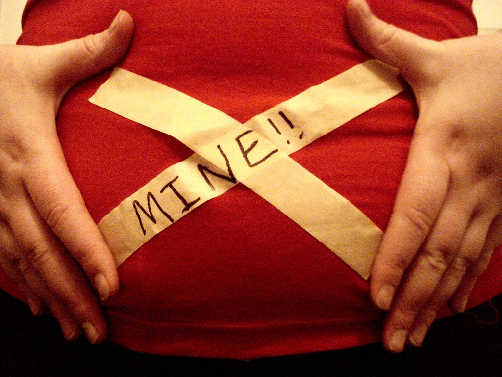 "Get your laws away from my uterus." (bitchplz/Flickr)