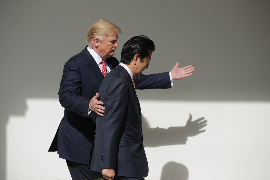 U.S. President Donald Trump and Japan Prime Minister Shinzo Abe walk together to their joint press conference in the East Room at the White House on February 10, 2017 in Washington, DC. (Chip Somodevilla/Getty Images)