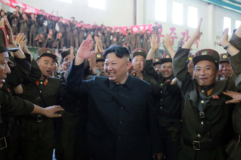 This picture taken on July 4, 2017 and released from North Korea's official Korean Central News Agency on July 5, 2017 shows North Korean leader Kim Jong-Un celebrating the successful test-fire of the intercontinental ballistic missile Hwasong-14 at an undisclosed location. (STR/AFP/Getty Images)