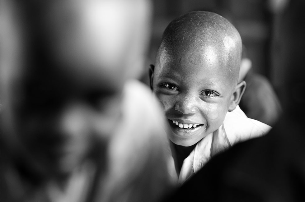 A smiling boy. (Dietmar Temps/Flickr)