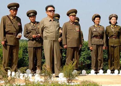 This undated picture, released from Korean Central News Agency on June 11, 2008, shows North Korean leader Kim Jong Il (L) inspecting Korean People's Army unit 958 at an undisclosed location. (STR/AFP/Getty Images)