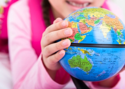 A student with a globe