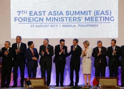 Foreign Ministers applaud after a group photo at the start of the 7th East Asia Summit Foreign Ministers' Meeting as part of the 50th ASEAN regional security forum in Manila on August 7, 2017 (Aaron Favila/AFP/Getty Images)