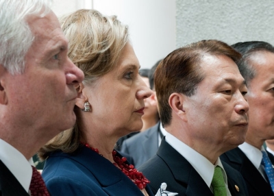 US Defense Secretary Robert Gates (L), US Secretary of State Hillary Clinton (2L), South Korean Foreign Minister Yu Myung-hwan (2R) and South Korean Defence Minister Kim Tae-young (R) stand together as they lay a wreath at the Korean War Memorial in Seoul on July 21, 2010. (Paul J. Richards/AFP/Getty Images)