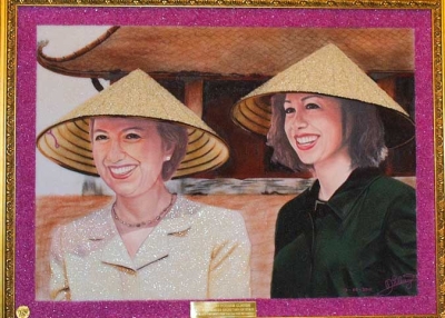 A mosaic portrait of US Secretary of State Hillary Clinton (L) and her daughter Chelsea by Vietnamese artist Dao Trong Cuong