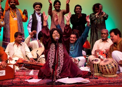 Abida Parveen (center) surrounded by fellow performers at the Asia Society in New York on July 22, 2010. (Suzanna Finley)