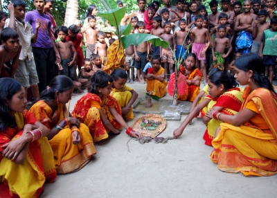 Bangladeshi villagers officiate a frog wedding in Sadullahpur district's Ramchandrapur village on August 10, 2010. (AFP/AFP/Getty Images) 