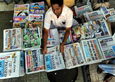 A Sri Lankan vendor displays daily newspapers in Colombo on September 9, 2010. President Mahinda Rajapakse, 64, secured the required two-thirds majority with 161 votes in the 225-member parliament, state television announced. (Ishara S. Kodikara/AFP/Getty Images) 