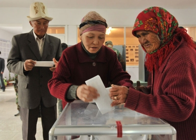 Kyrgyz women cast their votes at a polling station during the parliamentary elections in the village of Koy-Tash, some 15kms from Bishkek, on October 10, 2010. (Vyacheslav Oseledko/AFP/Getty Images) 