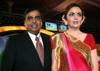 Indian industrialist Mukesh Ambani (L) poses with his wife Neeta Ambani at an awards ceremony in Mumbai on March 10, 2010. (STRDEL/AFP/Getty Images)