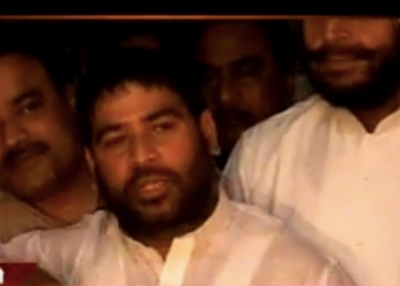In this screen grab from YouTube, Indian politician Sadhu Yadav speaks at a press conference in Bihar. 