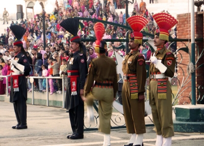 Indian and Pakistan border guards display strengths at Wagah border's flag-lowering ceremony. (suz kosh/Flickr)