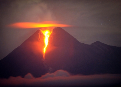 Molten lava flows from the crater of Mount Merapi in central Java on November 2, 2010.