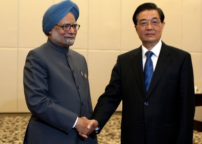 Indian Prime Minister Manmohan Singh (L), is greeted by Chinese president Hu Jintao, on April 13, 2011 in Sanya, Hainan Province, China for the 2011 BRICS Summit. (Nelson Ching/Pool/Getty Images)