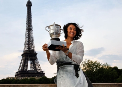 China's Li Na holds the Roland Garros French Open tennis championship trophy in front of the Eiffel Tower on June 4, 2011 in Paris a few hours after winning the French Open Women's final. Li Na made sporting history at the French Open today when she became the first player from China and from Asia to win a Grand Slam singles title. (Alexander Klein/AFP/Getty Images)