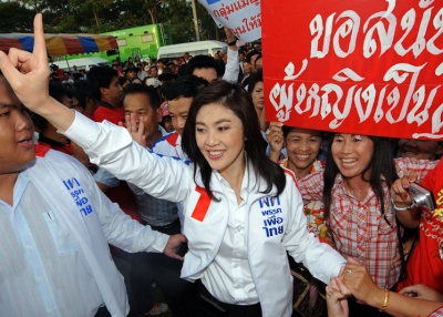 Pheu Thai candidate Yingluck Shinawatra greets supporters in Chiang Rai province on May 22, 2011. Shinawatra and her party went on to win a decisive victory in Thailand's elections on July 3. (Pornchai Kittiwongsakul/AFP/Getty Images)