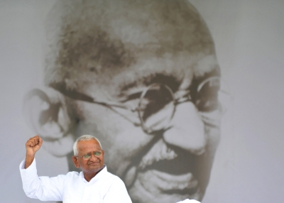 Indian activist Anna Hazare gestures to his supporters during his anti-corruption hunger strike in New Delhi on Aug. 21, 2011. (Sajjad Hussain/AFP/Getty Images)