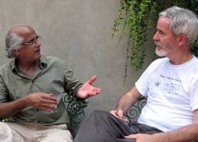 Chris Lydon (R) with Salman Rashid (L) in his walled garden on the south side of Lahore, summer 2011.