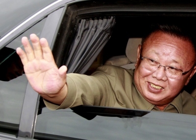 North Korean leader Kim Jong Il waves from a car after the meeting with Russian President Dmitry Medvedev at Sosnovy Bor Military Garrison, Zaigrayevsky District, Buryatia outside Ulan-Ude on August 24, 2011. (Dmitry Astakhov/AFP/Getty Images)