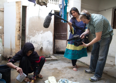 Sharmeen Obaid Chinoy (C) filming 'Saving Face' in the south of Punjab, Pakistan. (Sharmeen Obaid Films)