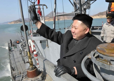 This undated picture, released from North Korea's official Korean Central News Agency on March 10, 2012 shows North Korean leader Kim Jong Un waving his hand on a naval vessel as he inspects Korean People's Army Navy Unit 123 honored with the title of O Jung Hup-led Seventh Regiment at undisclosed place in North Korea. (KNS/AFP/Getty Images)