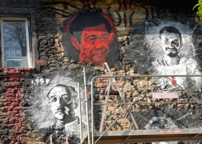 The likeness of Bo Xilai, in red, adorns the "Abode of Chaos" in France. (Thierry Ehrmann/Flickr)