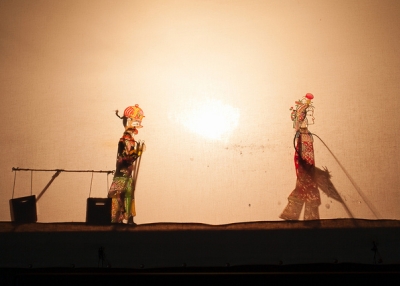 A boy and a girl meet in this shadow puppet show in Xi'an, China on September 9, 2012. (Poorfish/Flickr)