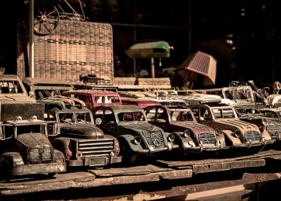 A row of vintage toy cars neatly lined up in an antique market stall in Shanghai, China on January 27, 2013. (ciaocibai/Flickr)