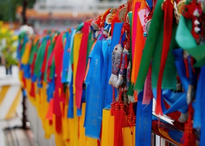 Colorful prayer ribbons and medals adorn the Kek Lok Si Temple in Penang, Malaysia on July 15, 2013. (ansel.ma/Flickr)