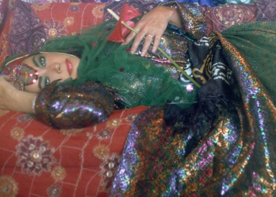 "Elizabeth Taylor Dressed as an Odalisque I at the Tehran Hilton Hotel, Iran, 1976." Printed 2011. (Firooz Zahedi/Leila Heller Gallery, NY)
